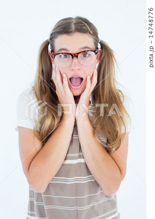 Surprised geeky hipster looking at camera Surprised geeky hipster looking at camera 14748776