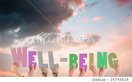 Composite image of hands holding up well being Composite image of hands holding up well being 14748816