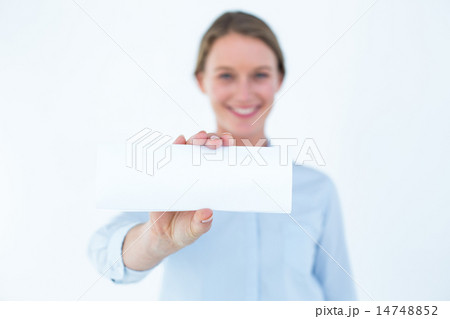 Businesswoman showing her business card 14748852