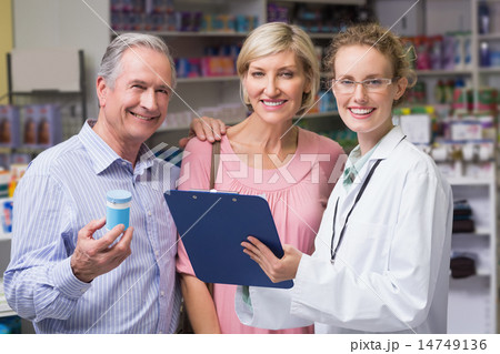 Pharmacist smiling at camera Pharmacist smiling at camera 14749136