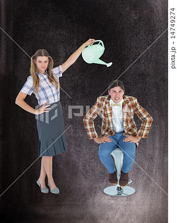 Composite image of geeky hipster watering her boyfriend Composite image of geeky hipster watering her boyfriend 14749274