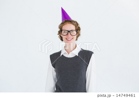 Geeky hipster wearing a party hat 14749461