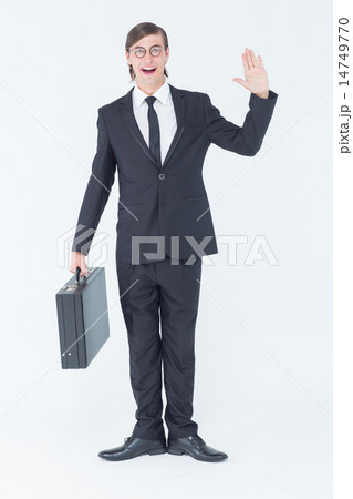 Geeky businessman waving at camera Geeky businessman waving at camera 14749770