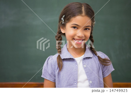Smiling pupil looking at camera 14749925