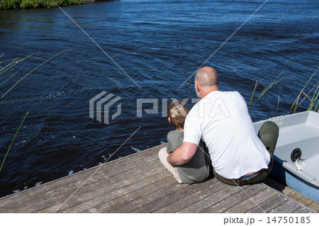 Happy man sitting with his son Happy man sitting with his son 14750185