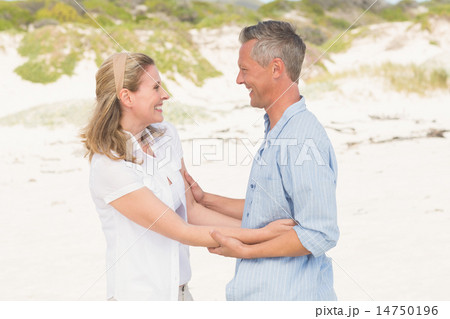 Happy couple smiling at each other 14750196