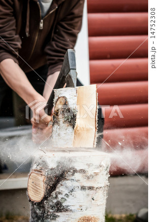 Wood chopping with hand axe 14752308
