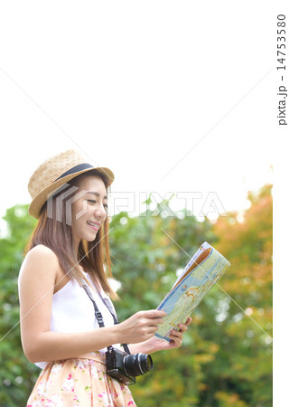 Young chinese traveller looking for direction 14753580