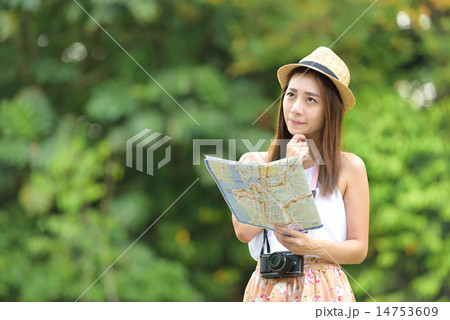 Young chinese traveller looking for direction 14753609