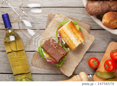 Two sandwiches with ham, cheese and tomatoes 14756579