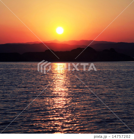 Sunset over greek island in the Mediterranean sea Sunset over greek island in the Mediterranean sea 14757202