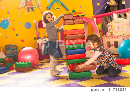 Two girls play 14758035