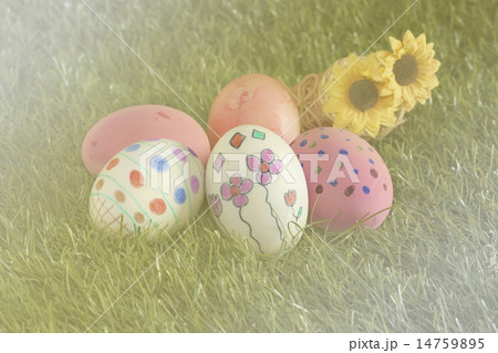 easter eggs and daisies in the grass easter eggs and daisies in the grass 14759895