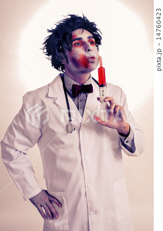 a zombie doctor with a syringe with blood, with a filter effect 14760423