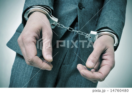 handcuffed man handcuffed man 14760480