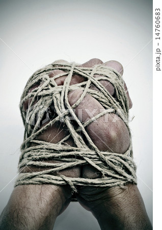 man hands tied with string 14760683