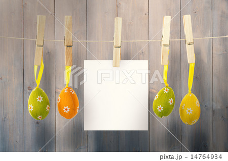 Composite image of hanging easter eggs 14764934