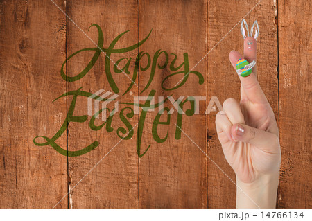 Composite image of fingers as easter bunny Composite image of fingers as easter bunny 14766134