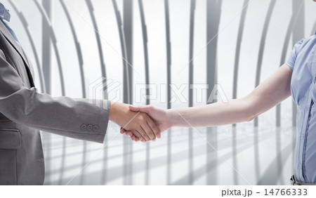 Composite image of handshake between two women 14766333
