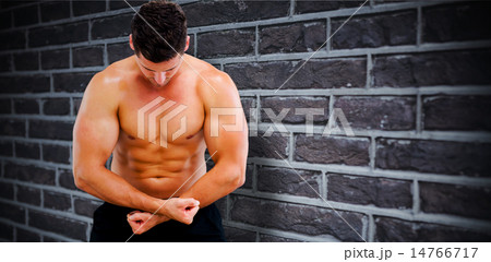 Composite image of bodybuilder posing 14766717