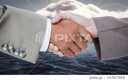 Composite image of side view of business peoples hands shaking 14767060