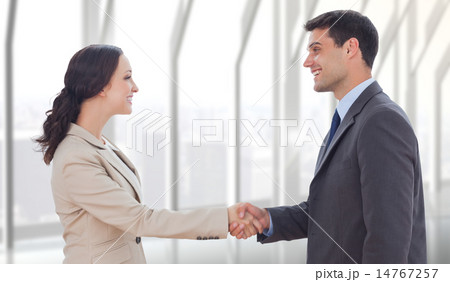 Composite image of future partners shaking hands Composite image of future partners shaking hands 14767257