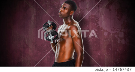Composite image of serious fit shirtless young man lifting dumbb 14767437