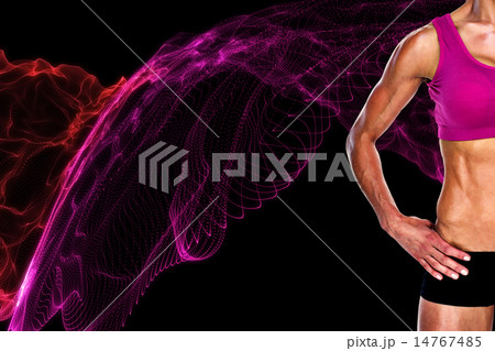 Composite image of female bodybuilder posing with hands on hips 14767485