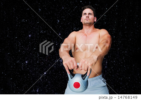 Composite image of bodybuilder holding kettlebell Composite image of bodybuilder holding kettlebell 14768149