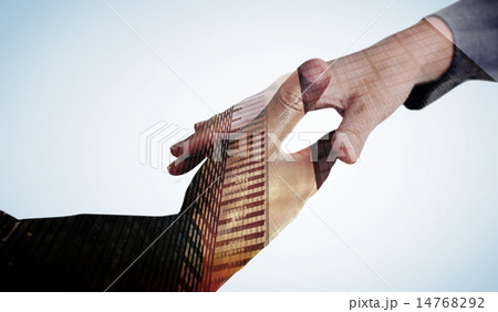 Composite image of businesspeople going to shake hands 14768292