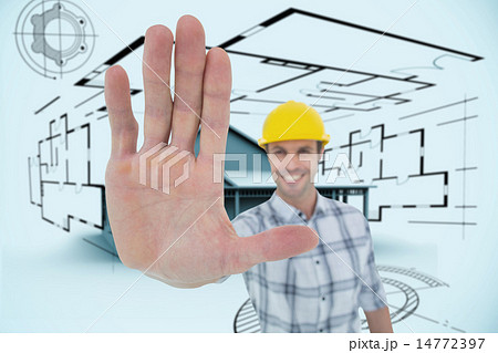 Composite image of carpenter showing palm over white background Composite image of carpenter showing palm over white background 14772397