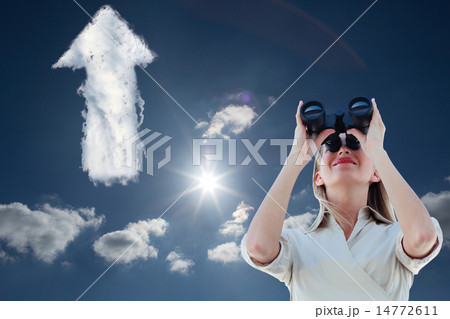 Composite image of businesswoman looking through binoculars Composite image of businesswoman looking through binoculars 14772611
