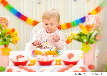 Portrait of eat smeared baby eating birthday cake Portrait of eat smeared baby eating birthday cake 14787910