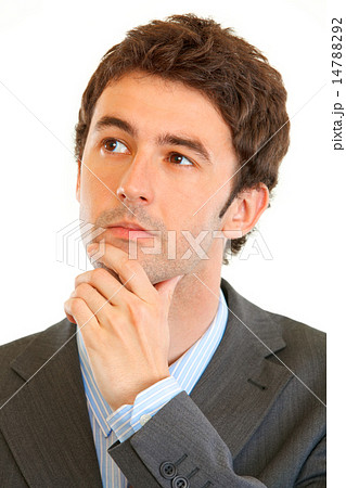 Portrait of serious modern businessman looking in corner at copy space. 14788292