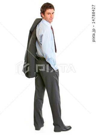 Full length portrait of smiling modern businessman looking back 14788427