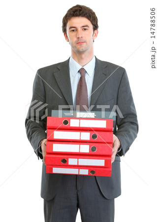 Modern businessman holding pack of folders Modern businessman holding pack of folders 14788506