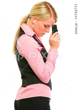 Sad modern business woman holding mobile near forehead 14788755