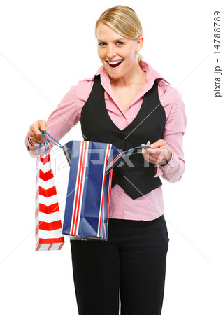 Surprised woman looking in shopping bag 14788789