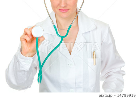 Medical doctor holding up stethoscope. Close-up.. Medical doctor holding up stethoscope. Close-up.. 14789919