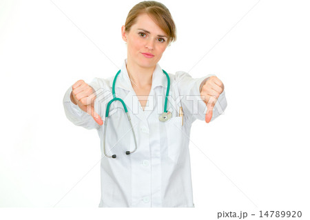 Displeased medical doctor woman showing thumbs down gesture. 14789920