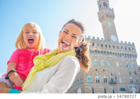 Portrait of smiling mother and baby girl in front of palazzo vec Portrait of smiling mother and baby girl in front of palazzo vec 14790727