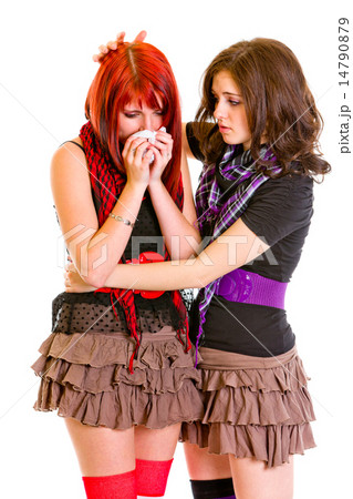 Attentive young girl calming her sad girlfriend. Attentive young girl calming her sad girlfriend. 14790879
