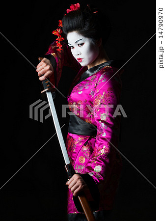 Portrait of geisha warrior pulls out sword of sheath on black Portrait of geisha warrior pulls out sword of sheath on black 14790970