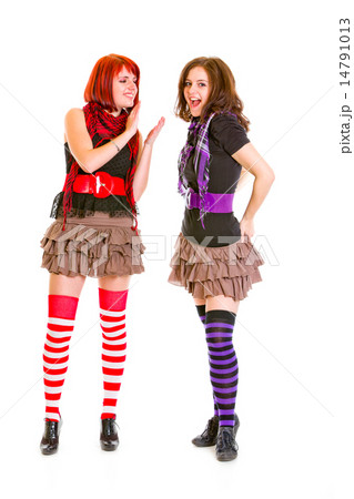 Pretty teen girl admiringly applauding her pleased girlfriend. 14791013