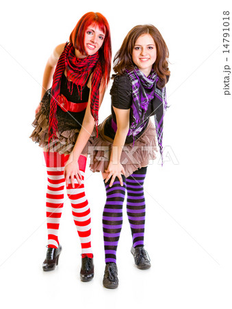 Two young girlfriends posing together. Two young girlfriends posing together. 14791018