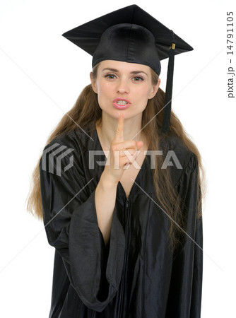 Smiling graduation student girl showing shh gesture Smiling graduation student girl showing shh gesture 14791105