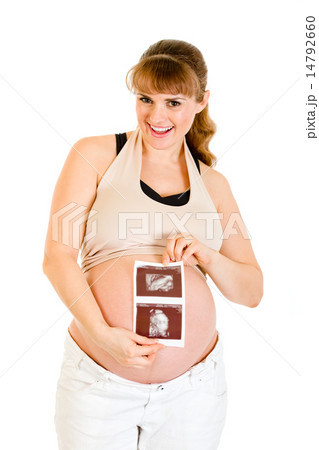 Laughing pregnant woman holding echo in hands. Laughing pregnant woman holding echo in hands. 14792660
