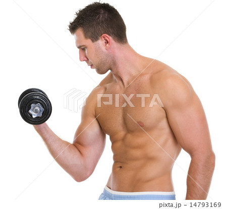 Strong male athlete raising dumbbell 14793169