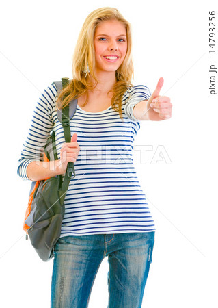 Happy pretty girl with backpack showing thumbs up gesture 14793256