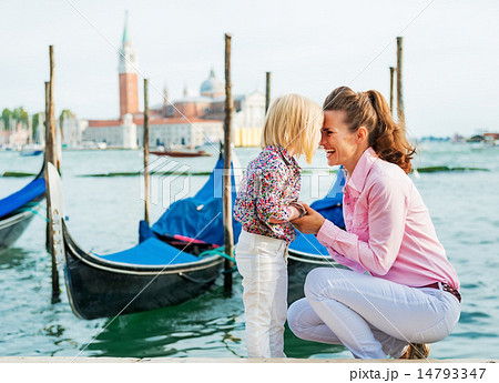 Portrait of happy mother and baby on grand canal embankment in v Portrait of happy mother and baby on grand canal embankment in v 14793347